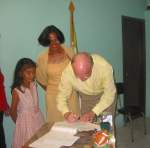 Signing the paper
